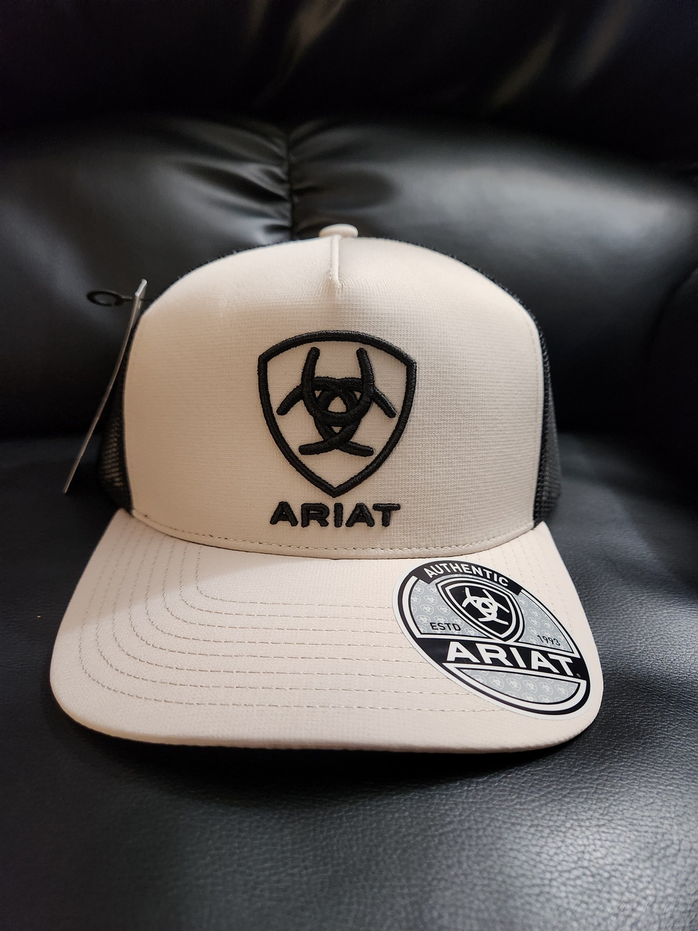 Ariat Man's Beige and Black Logo Trucker Hat